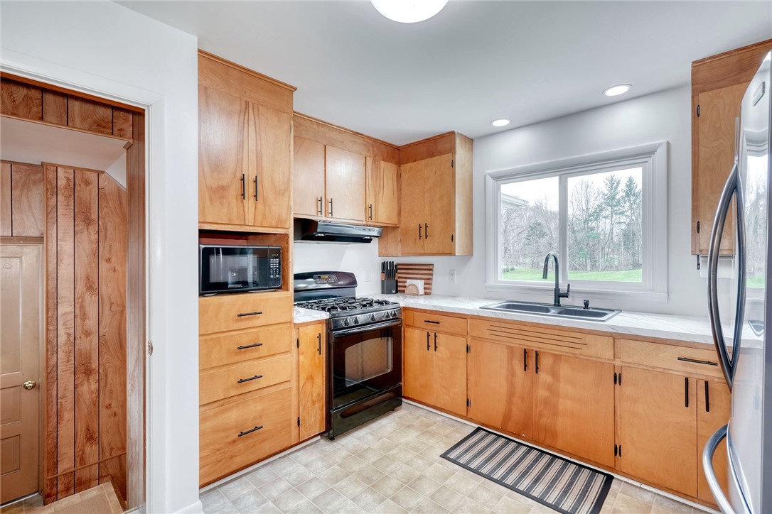 757 Klem Road Webster, NY 14580 - Photo 13 of 45 Eat-in Kitchen has Beautiful Pine Caibinetry and h