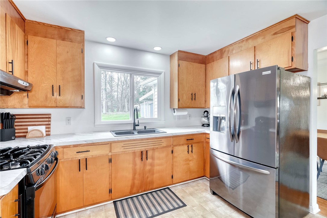 757 Klem Road Webster, NY 14580 - Photo 14 of 45 Eat-in Kitchen has Beautiful Pine Caibinetry and h