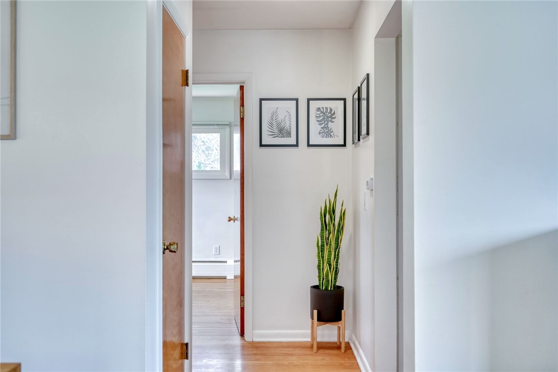 757 Klem Road Webster, NY 14580 - Photo 20 of 45 Hallway leads to 3 bedrooms and first floor full b