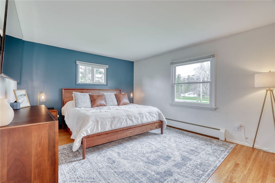 757 Klem Road Webster, NY 14580 - Photo 22 of 45 Primary bedroom with fresh paint, new PELLA window