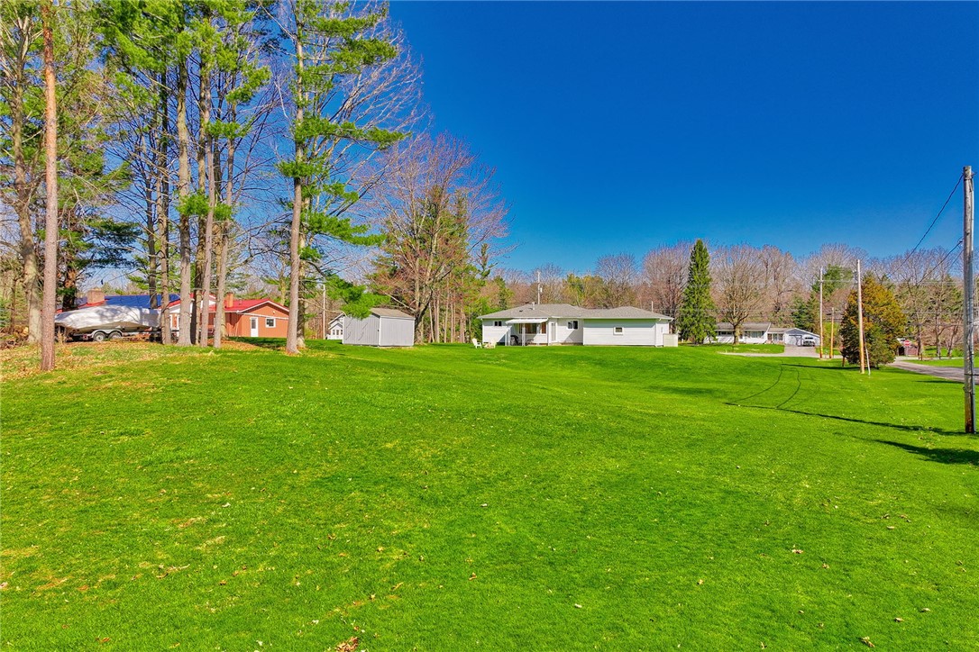 757 Klem Road Webster, NY 14580 - Photo 40 of 45 Rear view of the house from the back of the yard