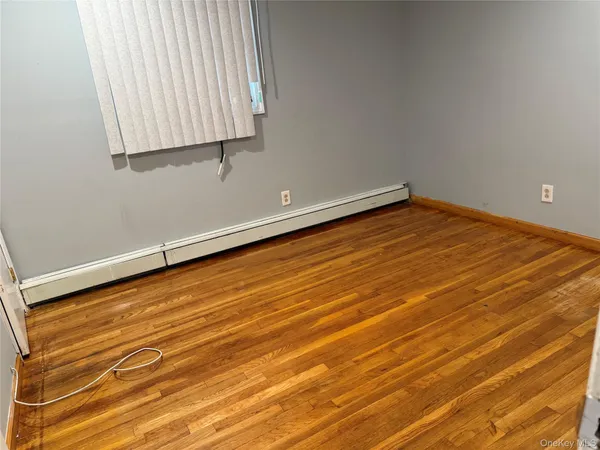 a view of empty room with windows