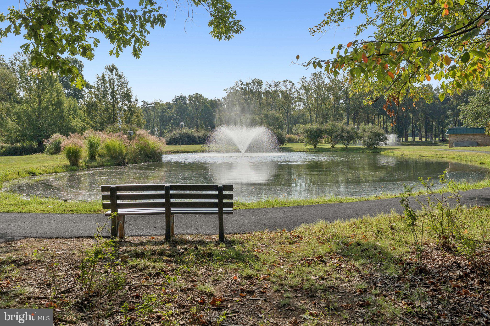 15115 Interlachen Drive, Unit 3815 Silver Spring, MD 20906 - Photo 2 of 27 a view of a lake with outdoor space