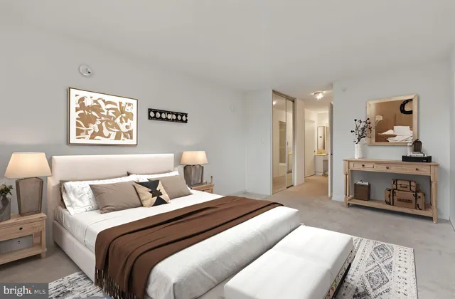 a bedroom with a bed and a couch