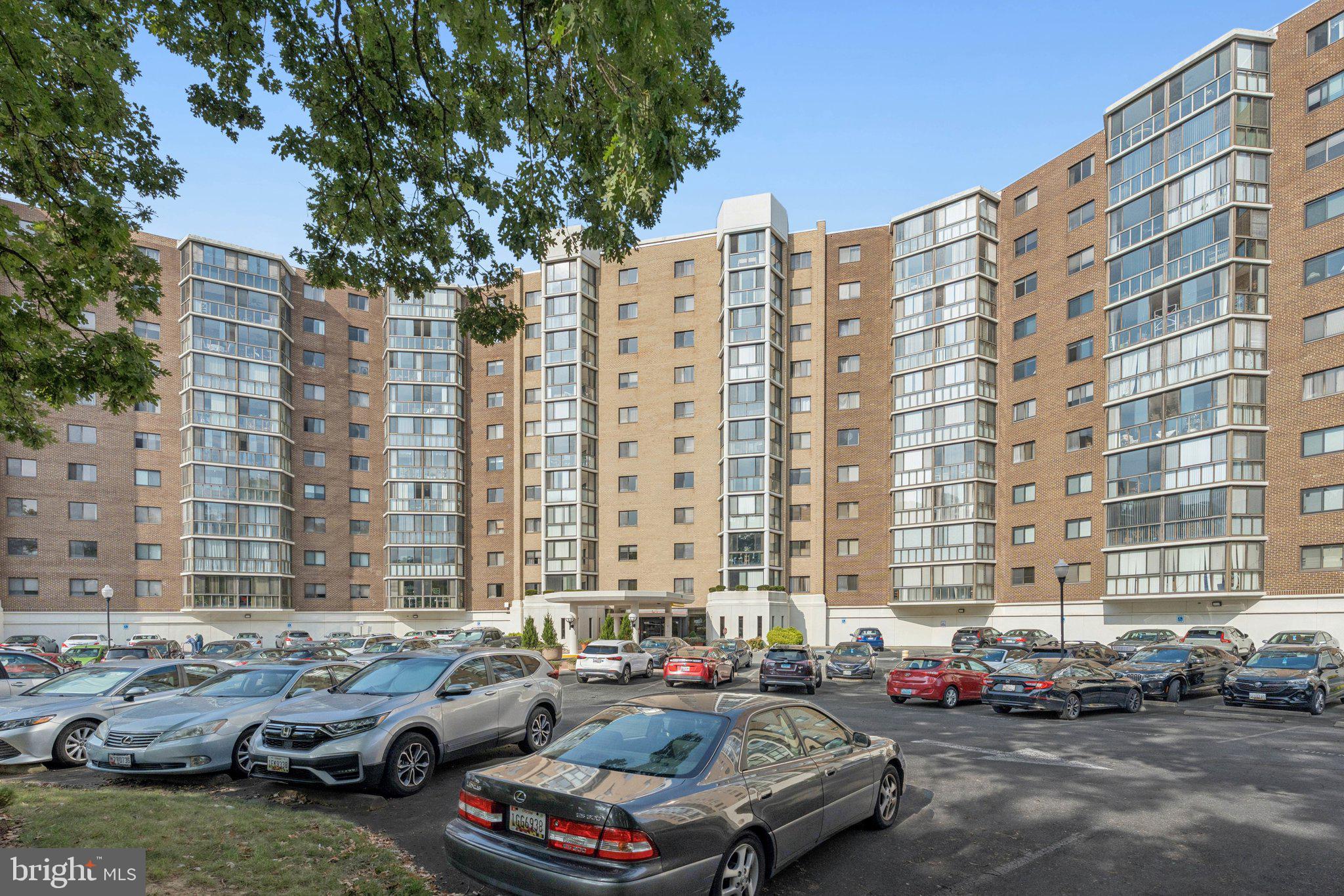 15115 Interlachen Drive, Unit 3815 Silver Spring, MD 20906 - Photo 3 of 27 a cars parked in front of a building