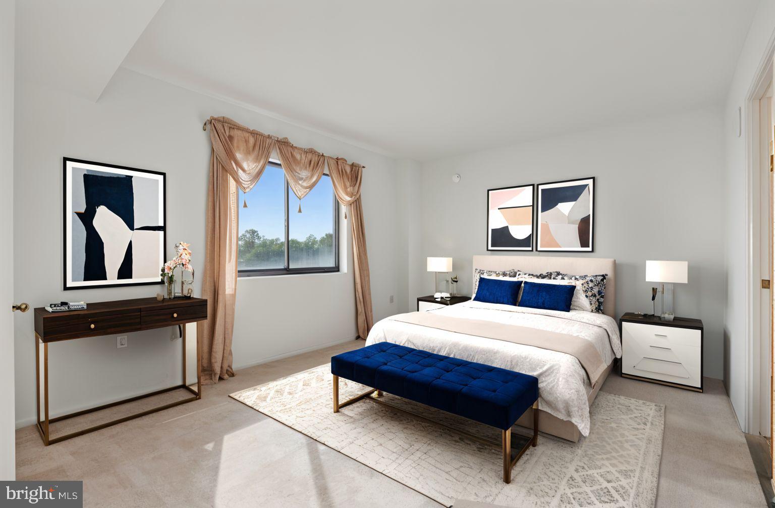 15115 Interlachen Drive, Unit 3815 Silver Spring, MD 20906 - Photo 9 of 27 a bedroom with a bed and glass windows