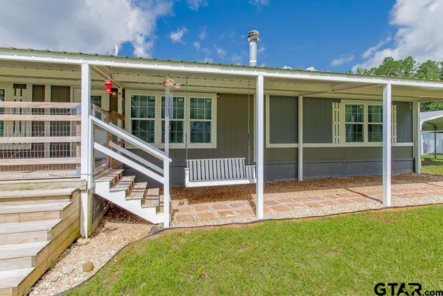 a view of kitchen with cabinets and wooden floor