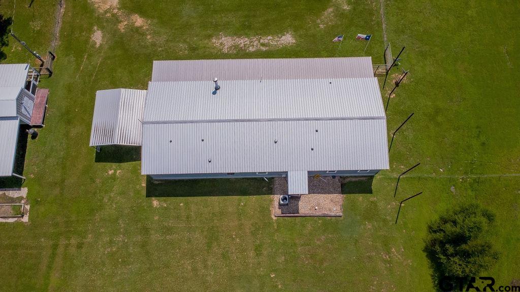 636 Roberson Road Hallsville, TX 75650 - Photo 6 of 46 an aerial view of house with yard swimming pool and outdoor seating