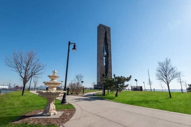1 Flagship Street, Unit 219 Bayonne, NJ 07002 - Photo 14 of 15 a view of a park with a tree