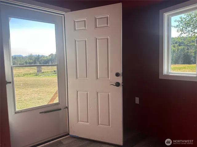 a view of an entryway with a window