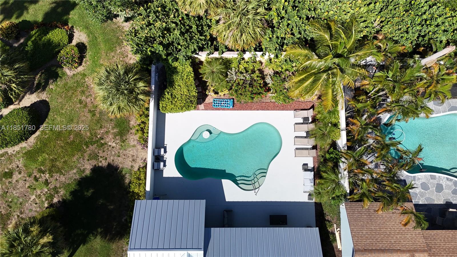 101 Sand Pine Drive, Unit 101 Jupiter, FL 33477 - Photo 28 of 33 an aerial view of a house