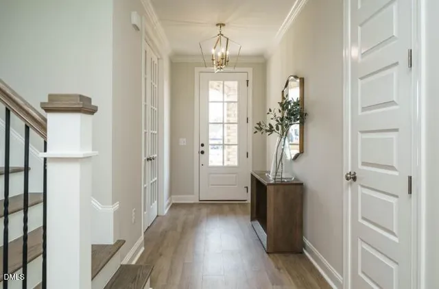 a front view of a house with garage