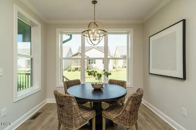 a kitchen with kitchen island a sink stove and refrigerator