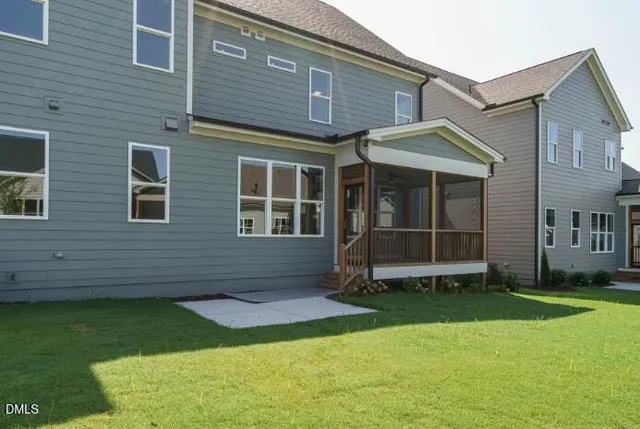 a view of a balcony with wooden floor