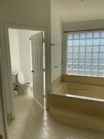 a view of swimming pool from a window