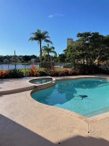 a view of a couches with wooden floor
