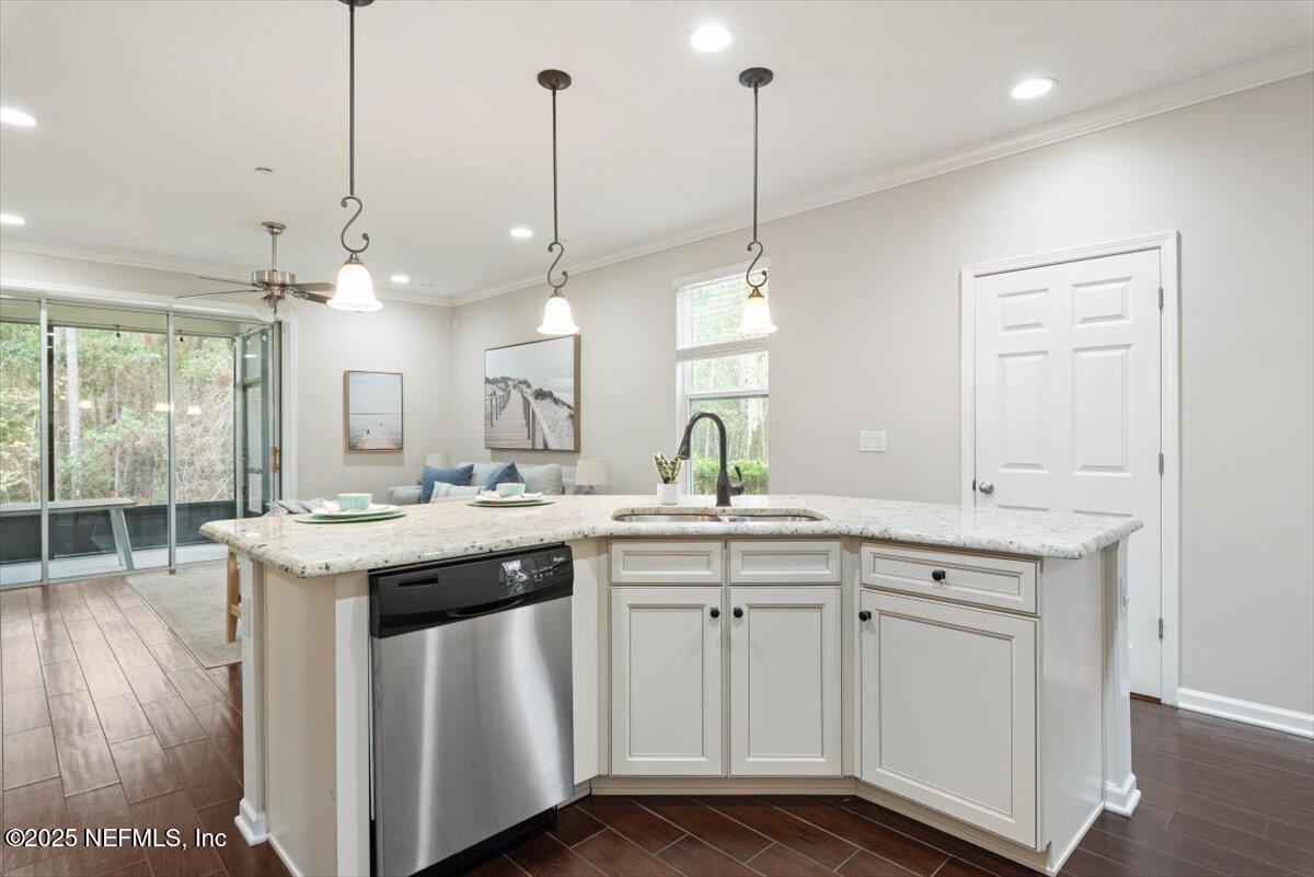 47 Myrtle Park Point Ponte Vedra, FL 32081 - Photo 12 of 58 a kitchen with sink stove and cabinets