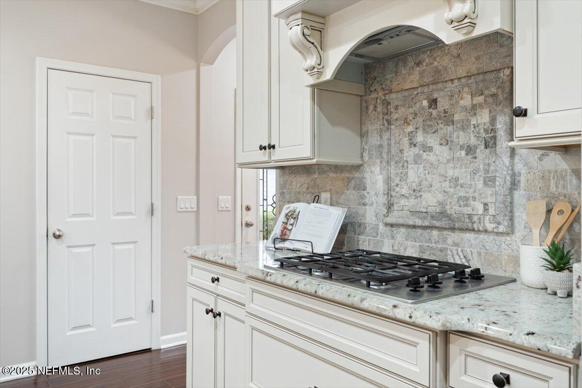 47 Myrtle Park Point Ponte Vedra, FL 32081 - Photo 13 of 58 a stove top oven sitting inside of a kitchen