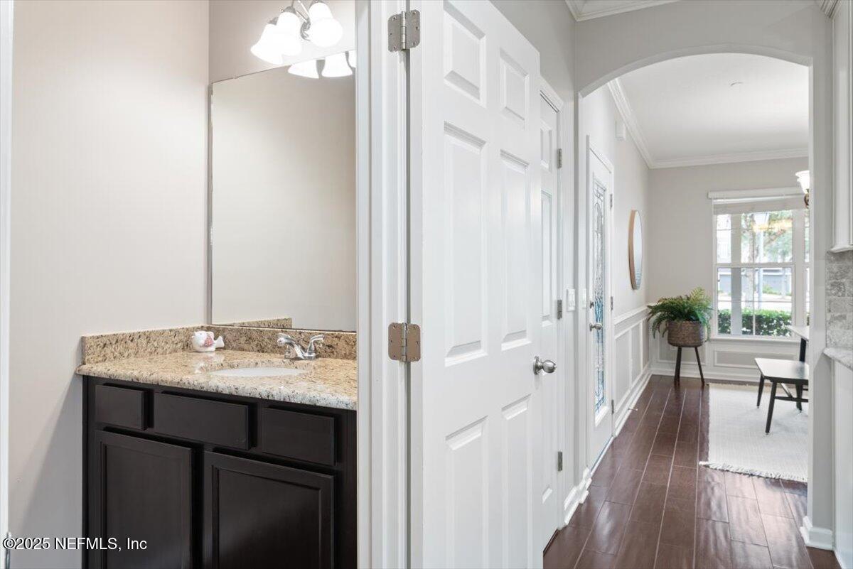 47 Myrtle Park Point Ponte Vedra, FL 32081 - Photo 15 of 58 a en suite bathroom with a sink vanity granite and a mirror