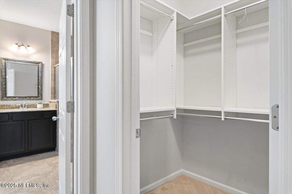 47 Myrtle Park Point Ponte Vedra, FL 32081 - Photo 22 of 58 a view of an empty walk in closet
