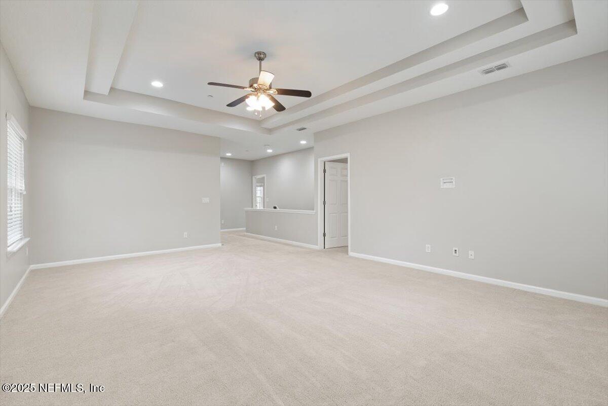 47 Myrtle Park Point Ponte Vedra, FL 32081 - Photo 29 of 58 an empty room with a ceiling fan and a fan