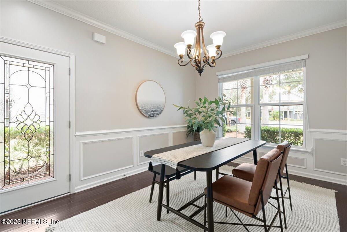 47 Myrtle Park Point Ponte Vedra, FL 32081 - Photo 8 of 58 a view of a dining room with furniture a chandelier and wooden floor