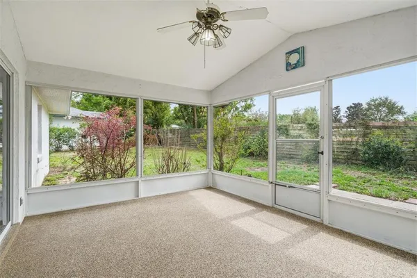 a view of a room with a large window