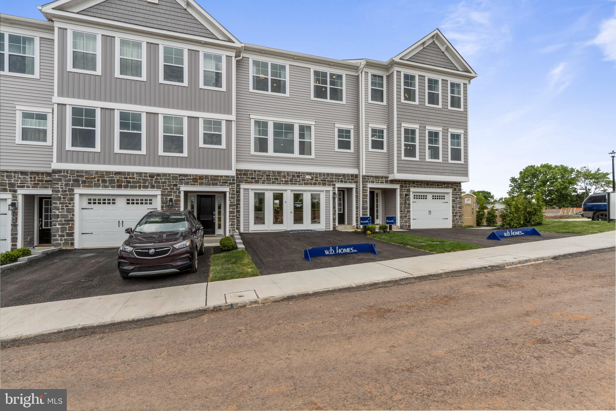 2 Jameson Way, Unit BASE Chalfont, PA 18914 - Photo 5 of 34 Front Exterior with 2-Car Garage