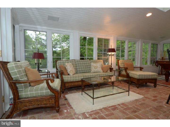 642 Mount View Road Berwyn, PA 19312 - Photo 7 of 25 a living room with furniture and a large window