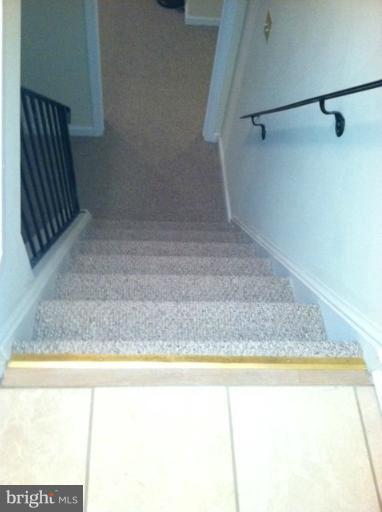 10316 Old Fort Road Fort Washington, MD 20744 - Photo 17 of 29 Foyer and Basement Steps