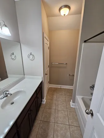 a bathroom with a shower and toilet