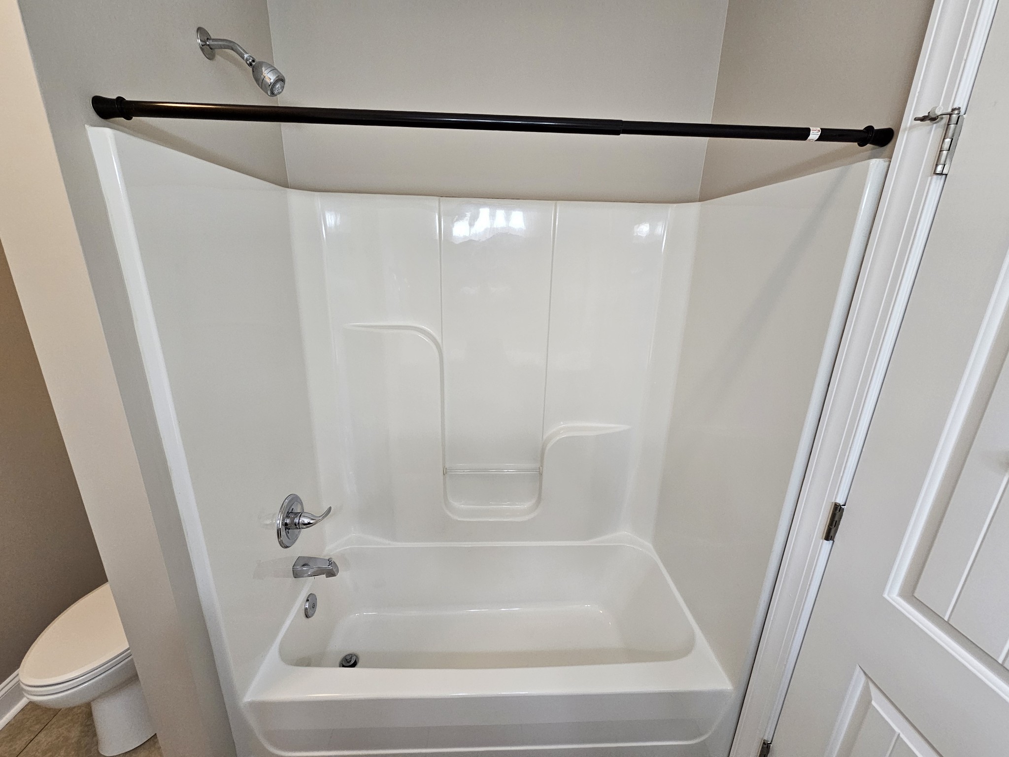 322 Rowlette Circle Murfreesboro, TN 37127 - Photo 19 of 23 a bathroom with a shower and toilet