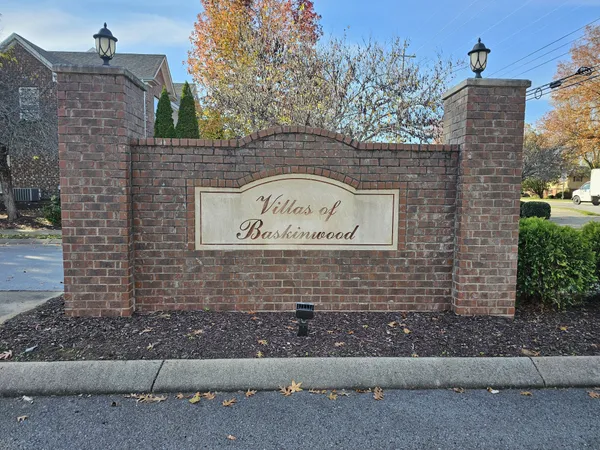 a sign that is on the side of a building