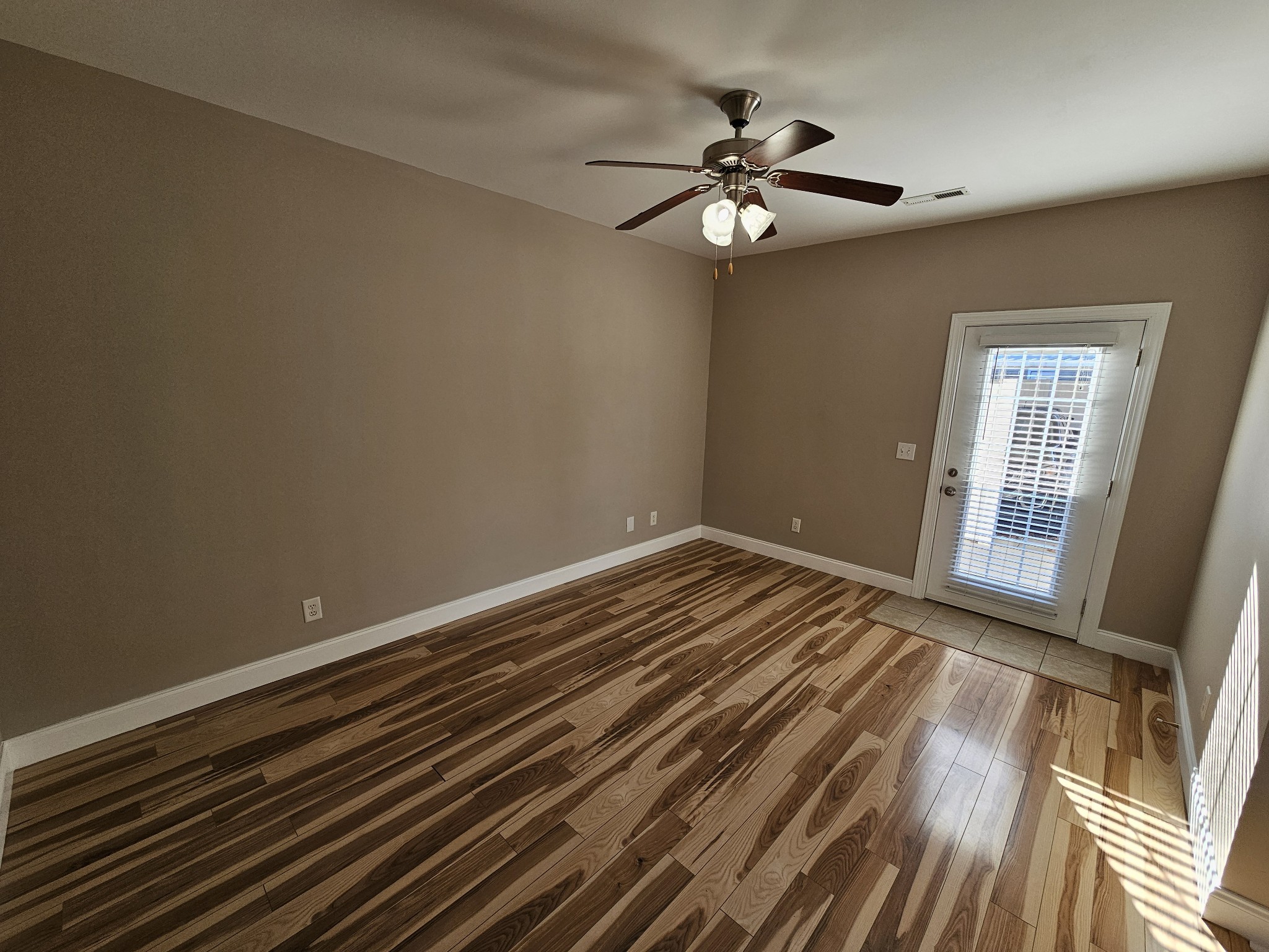 322 Rowlette Circle Murfreesboro, TN 37127 - Photo 6 of 23 a view of a room with wooden floor and fan