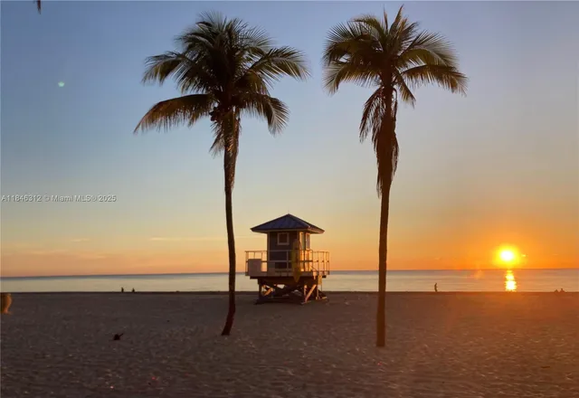 a ocean view with beach