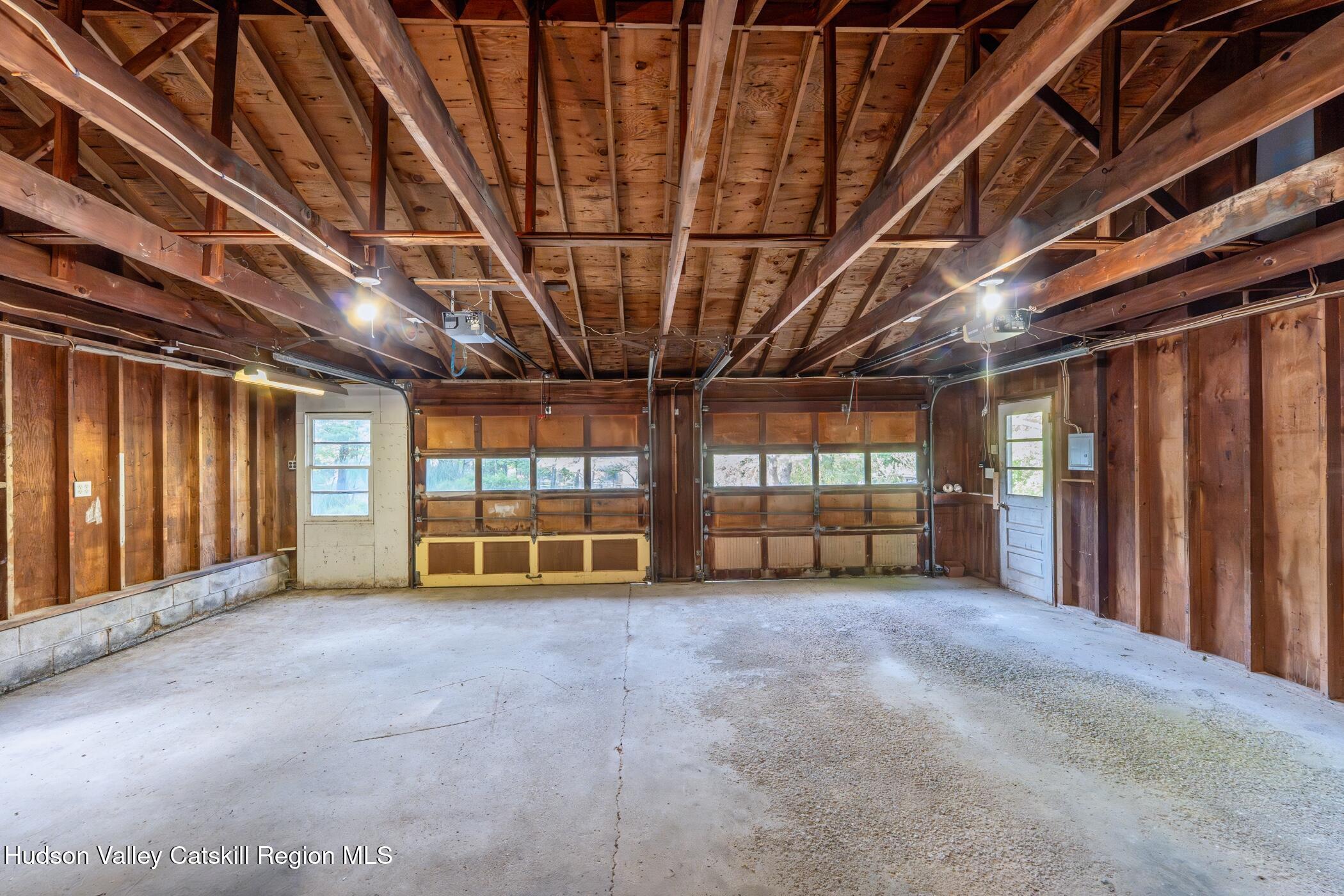 4533 Atwood Road Stone Ridge, NY 12484 - Photo 51 of 63 a view of an empty room with windows