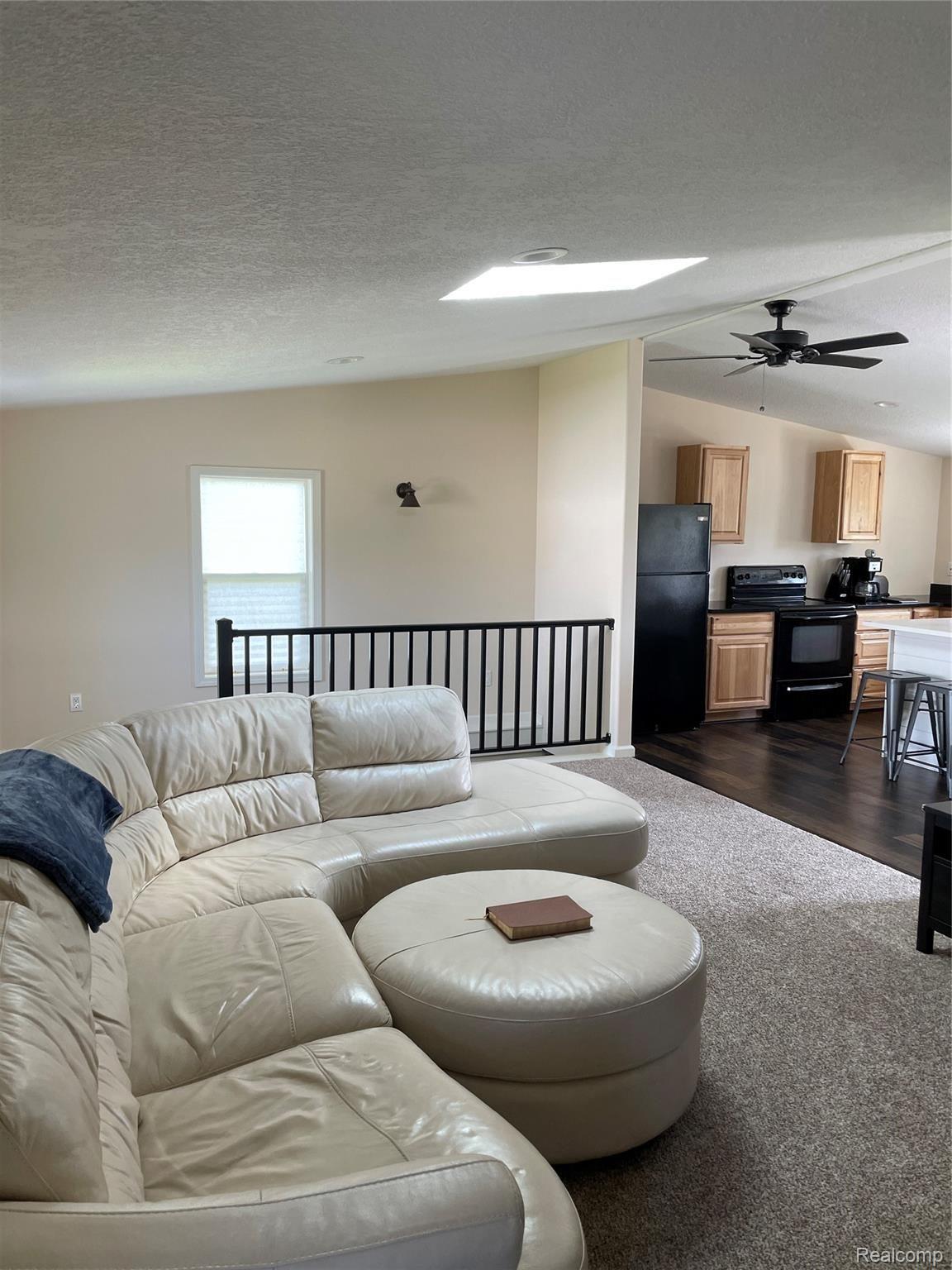 Spacious living room open to kitchen