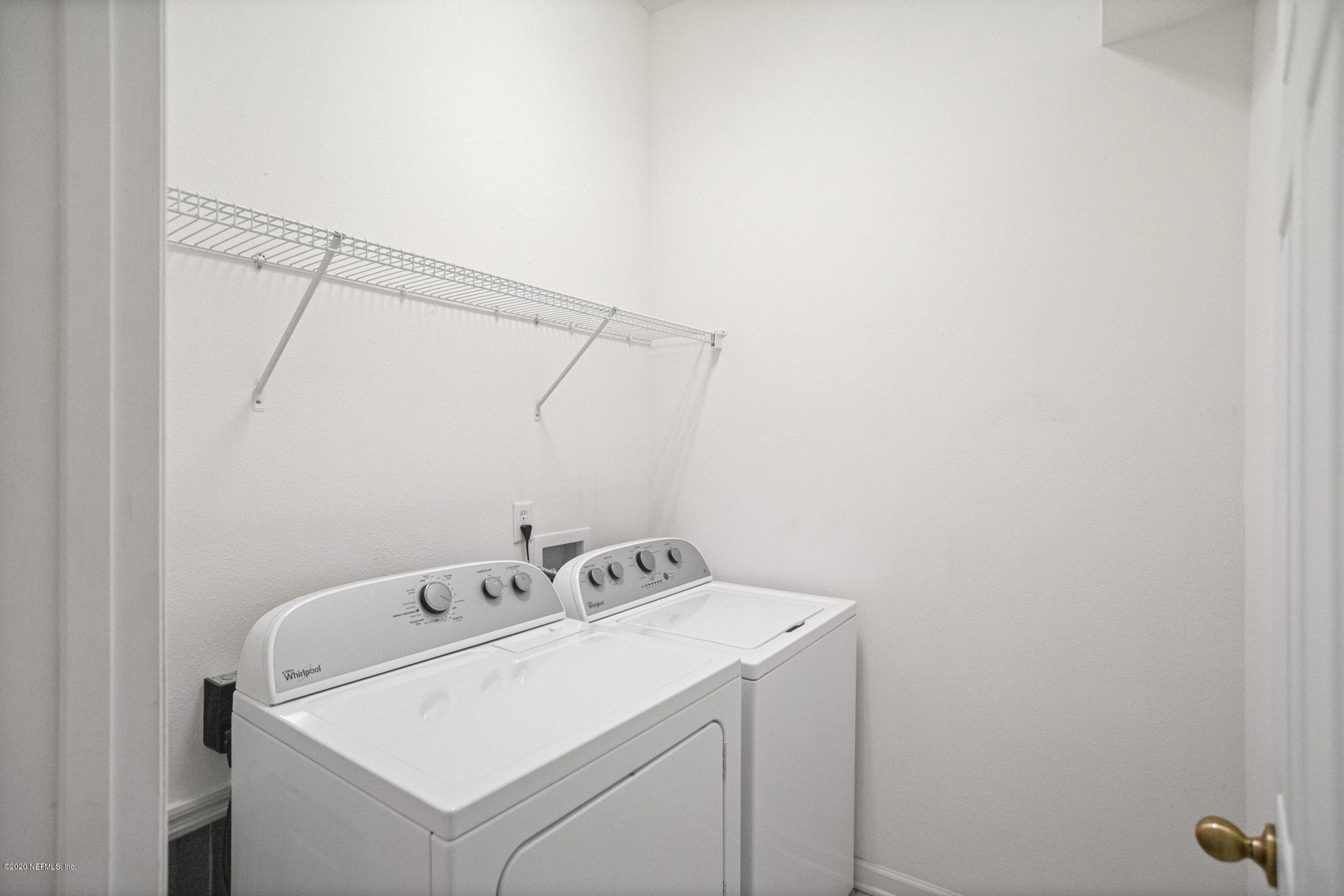 5784 Sandstone Way Jacksonville, FL 32258 - Photo 19 of 29 a utility room with dryer and washer