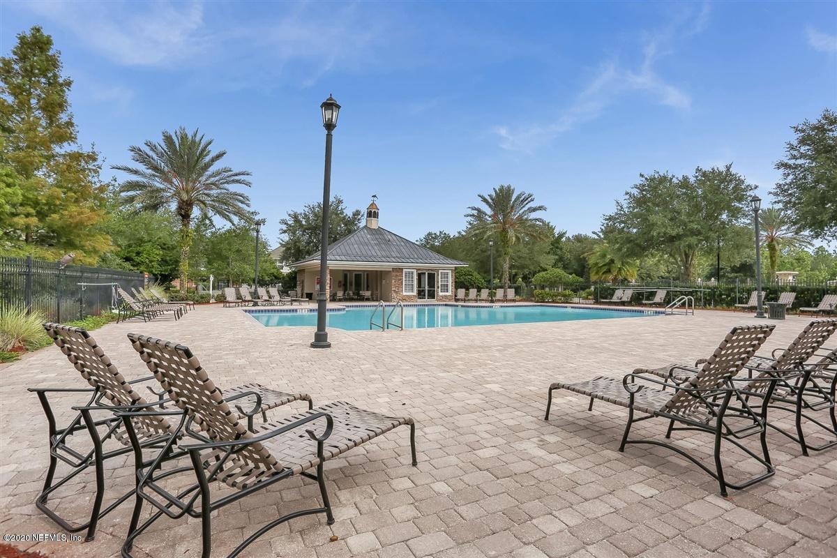 5784 Sandstone Way Jacksonville, FL 32258 - Photo 29 of 29 a view of a house with backyard and sitting area