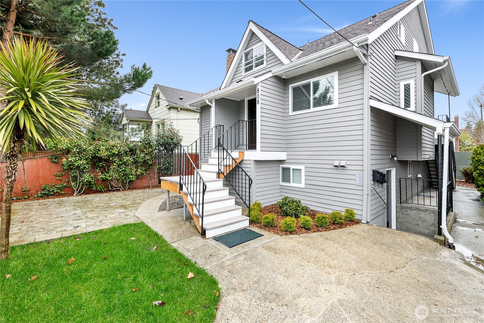 808 Northwest Market Street Seattle, WA 98107 - Photo 1 of 18 a view of a backyard with plants and a patio
