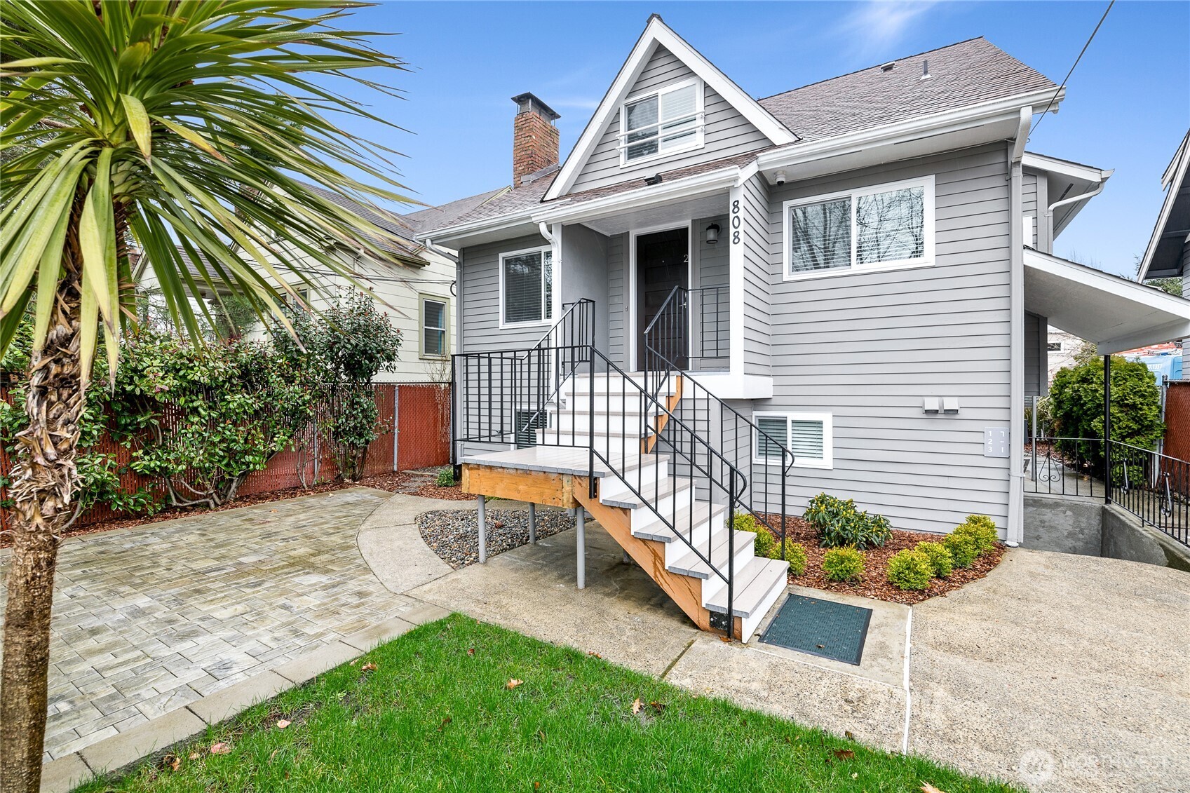 808 Northwest Market Street Seattle, WA 98107 - Photo 3 of 18 a front view of a house with garden