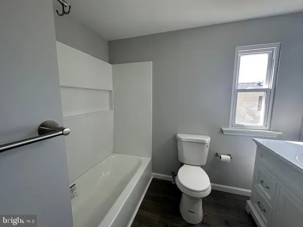 a bathroom with a sink and a toilet