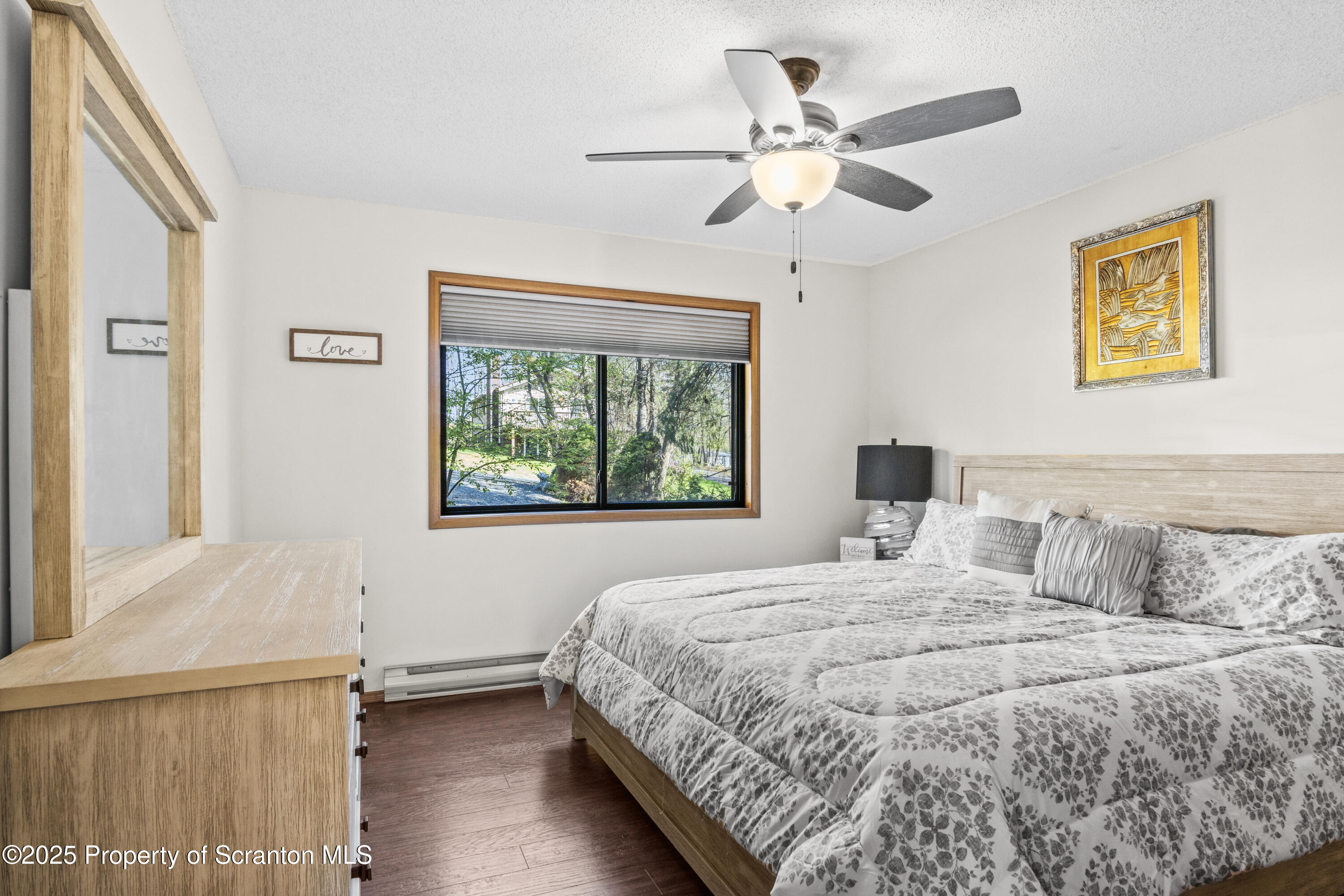 41 Crest View Road Lake Ariel, PA 18436 - Photo 15 of 54 a bedroom with a large bed and a window