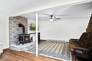 41 Crest View Road Lake Ariel, PA 18436 - Photo 34 of 54 a living room with furniture and a fireplace