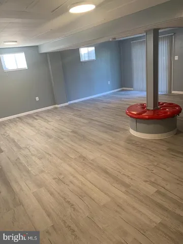 a view of a room with a fireplace