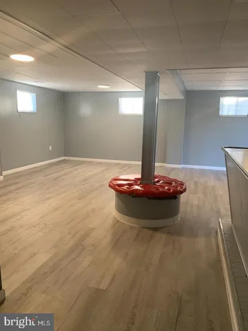 a view of a hall with a dining table