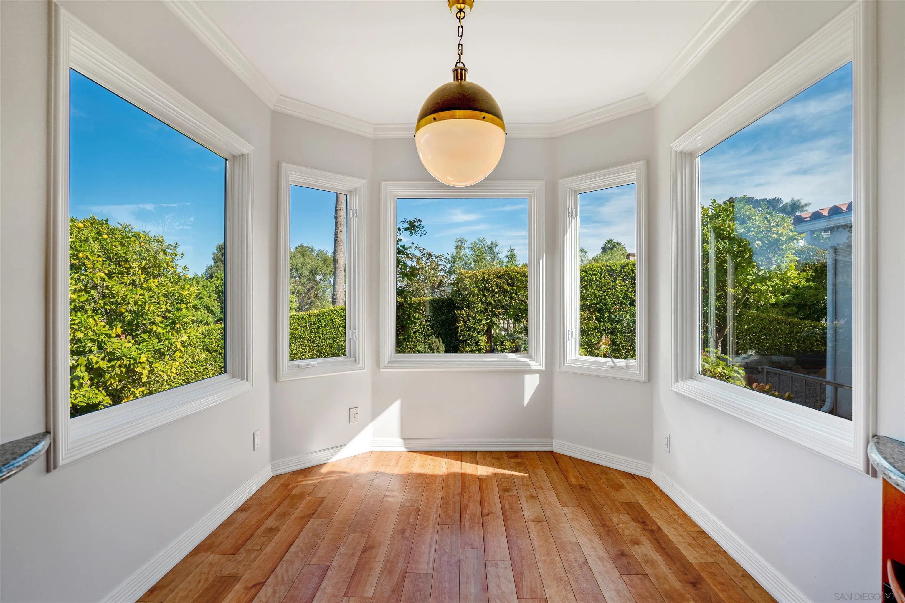 1865 Soledad Avenue La Jolla, CA 92037 - Photo 16 of 32 a view of a room with wooden floor and a window