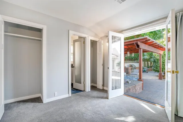 a view of empty room with windows