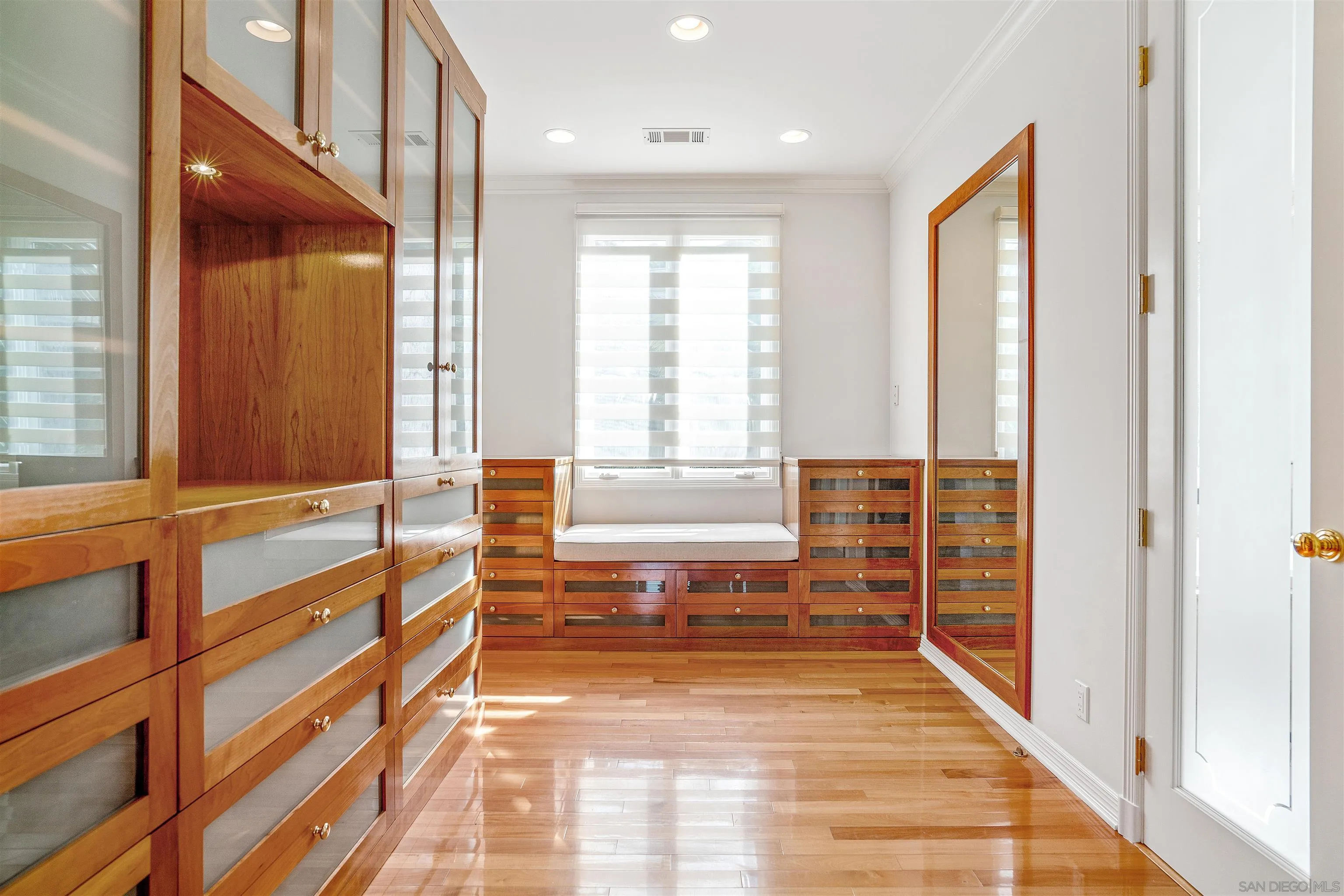 1865 Soledad Avenue La Jolla, CA 92037 - Photo 10 of 32 a view of a hallway with wooden floor and windows