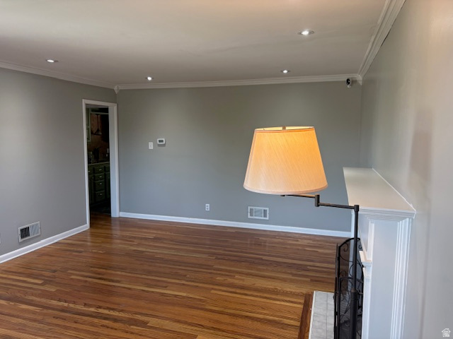 2313 150 East Bountiful, UT 84010 - Photo 6 of 39 Living space featuring wood-finish flooring, recessed ceiling lighting, crown molding, and a white mantelpiece